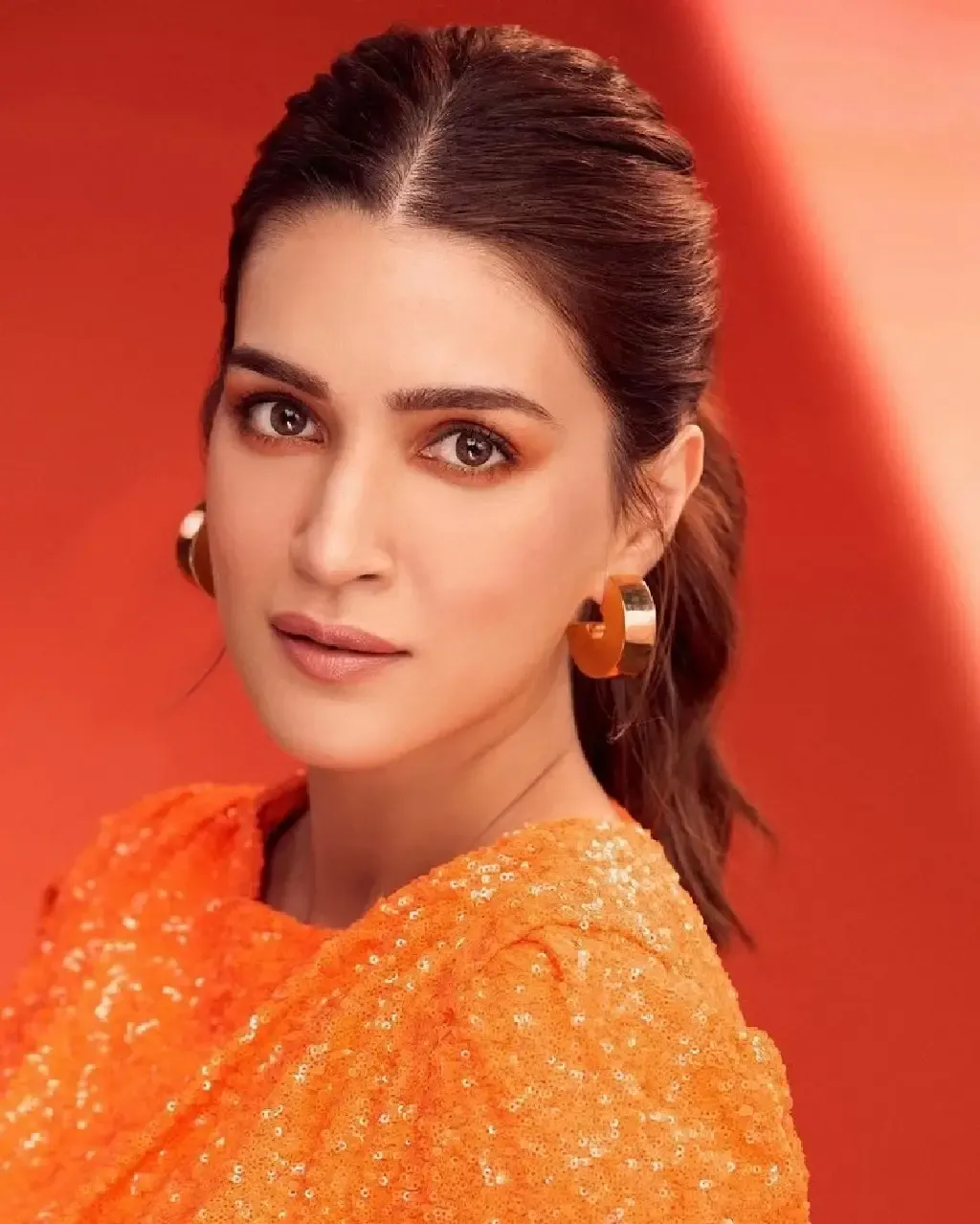 SOUTH INDIAN GIRL KRITI SANON PHOTOSHOOT IN ORANGE TOP 3